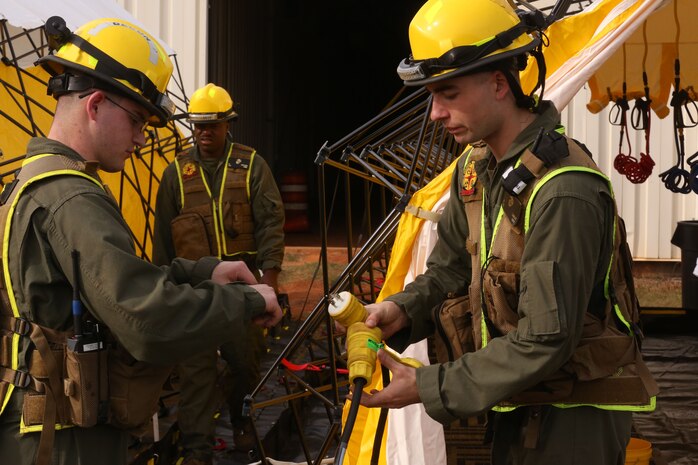 PERRY, Ga. – Decontamination Platoon and Identification and Detection Platoon with Chemical Biological Incident Response Force, CBIRF, U.S. Marine Corps Forces Command, executed Advanced Decontamination/ Identification and Detection Training at Guardian Centers, Perry, Ga., Dec. 11-14, 2017. During the week-long training the platoons refined their skills in setup and breakdown of decontamination sites, decontamination of role players, and identification and detection of known agents in several scenarios including mass casualty, radiation scenario and a subway scenario.  (Official USMC Photos by Staff Sgt. Santiago G. Colon Jr.)
