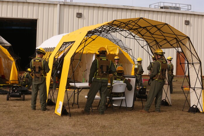 PERRY, Ga. – Decontamination Platoon and Identification and Detection Platoon with Chemical Biological Incident Response Force, CBIRF, U.S. Marine Corps Forces Command, executed Advanced Decontamination/ Identification and Detection Training at Guardian Centers, Perry, Ga., Dec. 11-14, 2017. During the week-long training the platoons refined their skills in setup and breakdown of decontamination sites, decontamination of role players, and identification and detection of known agents in several scenarios including mass casualty, radiation scenario and a subway scenario.  (Official USMC Photos by Staff Sgt. Santiago G. Colon Jr.)