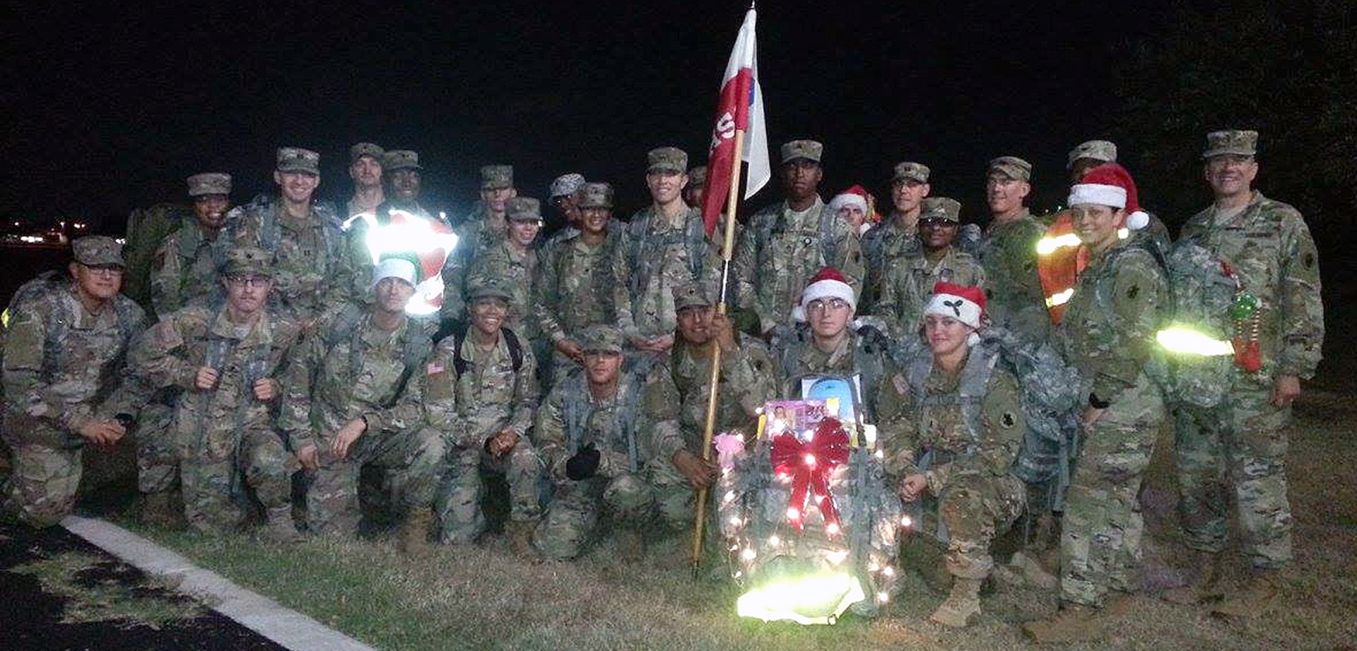 Soldiers from the U.S. Army South Headquarters Support Company gathered early Dec. 14 at the MacArthur Parade Field and stuffed lots of toys and goodies into their ruck sacks before heading off on a three-mile road march Joint Base San Antonio-Fort Sam Houston Child Development Center.