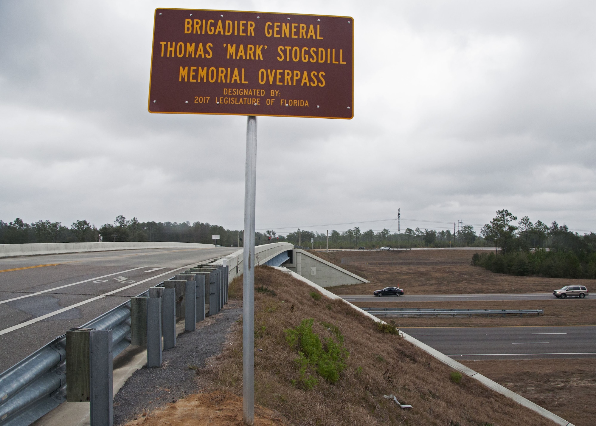 A freshly installed sign dedicated to the memory of the late Brig. Gen. Thomas “Mark” Stogsdill stands above the Florida State Road 85 overpass