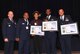 Moody Airmen accept the Distinguished Volunteer award during the 2017 National Public Benefit Flying Awards, Nov. 29, in Arlington, Va. Awarded for the success of hosting a youth aviation event in honor of the Tuskegee Airmen, they coordinated the largest Legacy Flight Academy’s “Eyes Above the Horizon” diversity outreach event. This past summer, they gave approximately 100 South Georgian youth a chance to fly and explore aviation and Science, Technology, Engineering, and Mathematics career opportunities. (Courtesy photo)