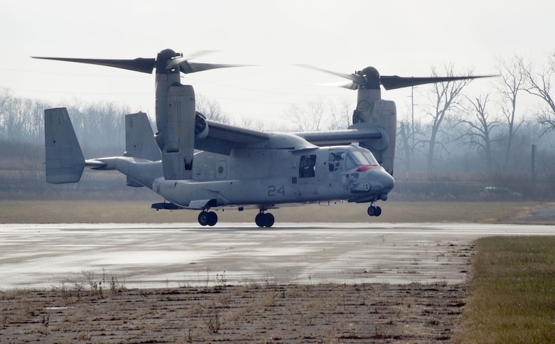 An U.S. Marine Corps MV-22 Osprey belonging to Air Test and Evaluation Squadron 21 (HX-21) lands at Wright-Patterson Air Force Base, Ohio, Area B, near the National Museum of the Air Force Dec. 19, 2017. The aircraft was signed over to Naval Medical Research Unit-Dayton to be used in research to minimize injuries to aircrew members. (U.S. Air Force photo by R.J. Oriez)