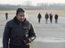 Navy Cmdr. Tatana Olson, Naval Aerospace Medical Research Laboratory deputy director, joins her Naval Medical Research Unit-Dayton shipmates in a foreign-object-damage walk-down Dec. 19, 2017, on the Wright-Patterson Air Force Base, Ohio, Area B flight line in preparation for the arrival of a Marine Corps MV-22 Osprey aircraft. The aircraft was acquired by NAMRU-D to be used in research to minimize injuries to aircrew members. (U.S. Air Force photo by R.J. Oriez)