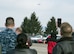 Members of Naval Medical Research Unit-Dayton watch a Marine Corps MV-22 Osprey approach over Wright-Patterson Air Force Base, Ohio, Dec. 19, 2017. NAMRU-D was acquiring the aircraft for use in medical research with the goal of minimizing injuries to aircrew members and maintenance workers. (U.S. Air Force photo by R.J. Oriez)