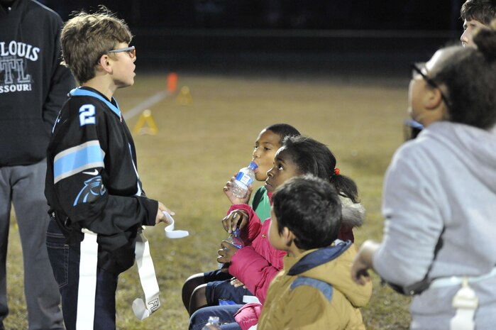 Everett, Weapons Station youth center participant, increases his teammates’ morale through a motivating speech during half time Dec. 14, 2017, at Joint Base Charleston – Weapons Station, S.C.