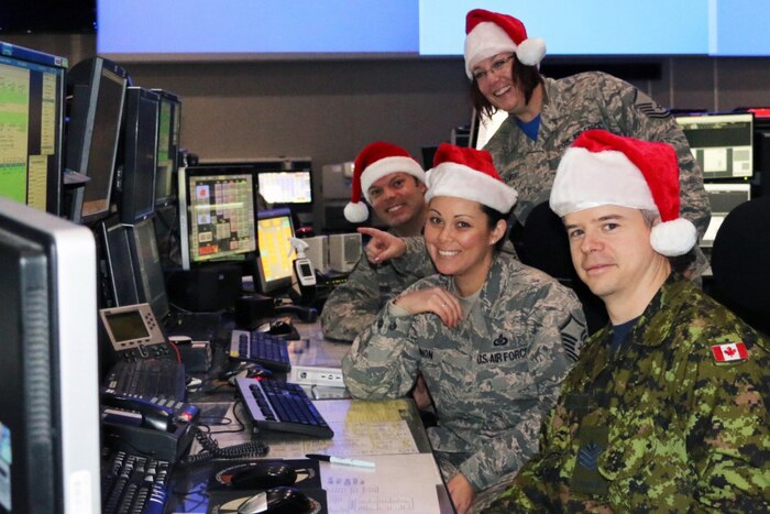 Eastern Air Defense Sector personnel conduct training in preparation for Santa tracking operations at their headquarters in Rome, N.Y.