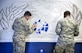Vehicle operators from the 628th Logistics Readiness Squadron paint an occupational badge at the vehicle operations building on Joint Base Charleston, S.C., Dec. 9, 2017.