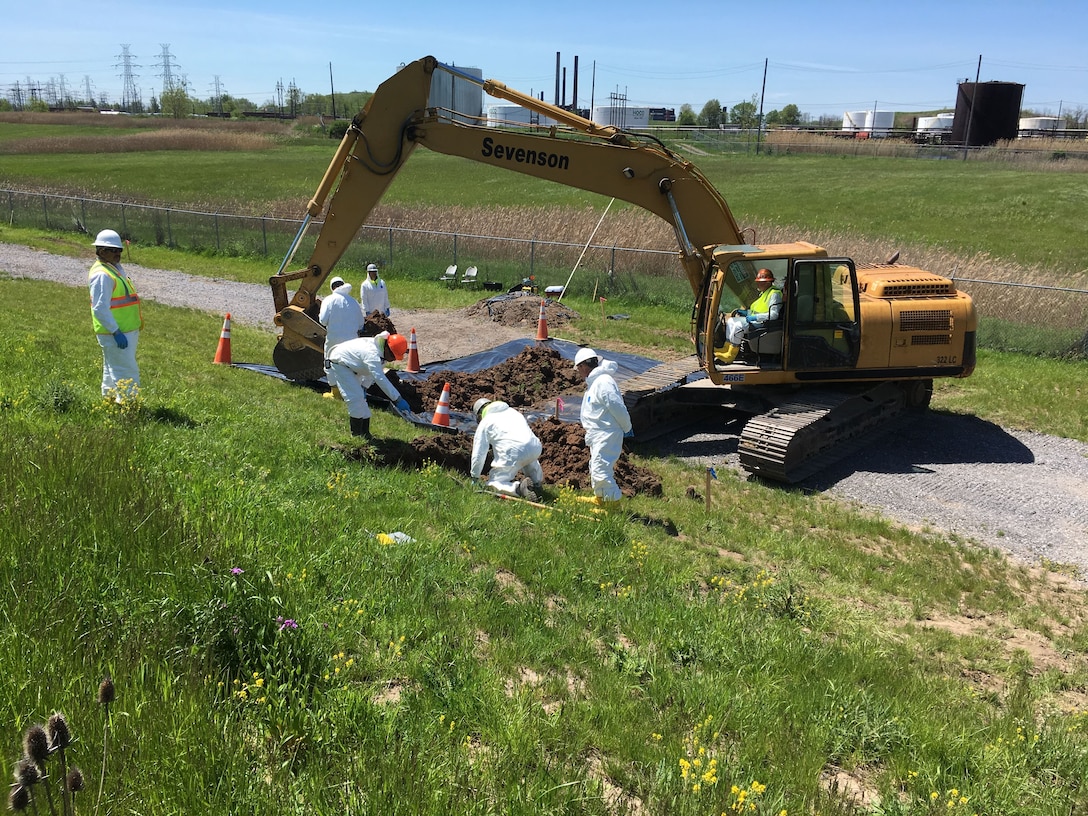 Excavating a test pit in the Seaway FUSRAP site Southside in May 2017.