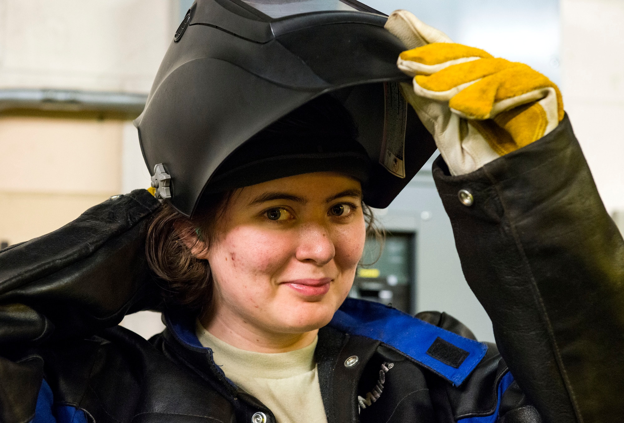 Airman 1st Class Heather Chambers, 23d Maintenance Squadron aircraft metals technology journeyman, poses for a photo, Dec. 19, 2017, at Moody Air Force Base, Ga. Metals technology technicians strive for perfection when fabricating and repairing Team Moody’s aircraft and equipment to ensure they maintain their continual high ops tempo. (U.S. Air Force photo by Airman 1st Class Erick Requadt)