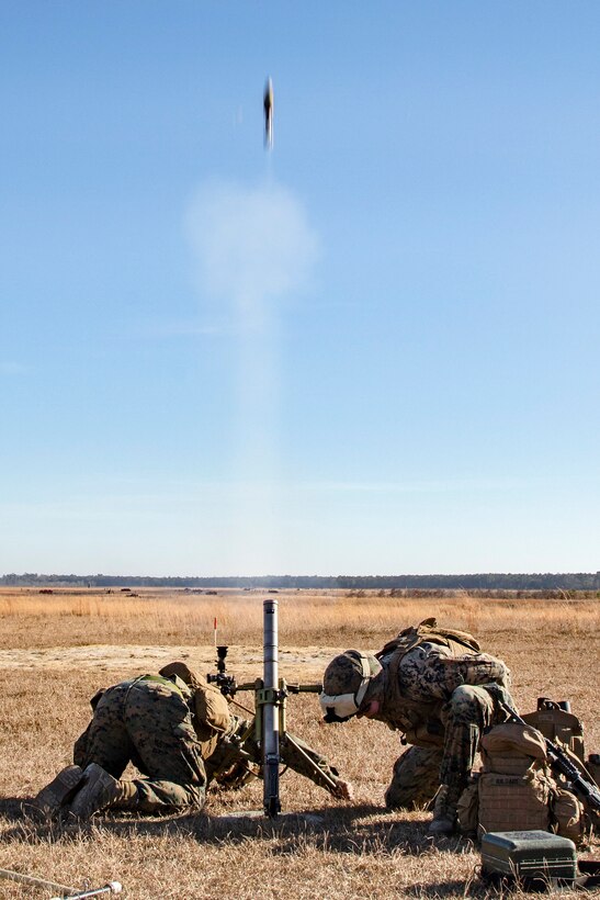 Marines fire a M224 60mm mortar system during a live-fire mortar exercise.