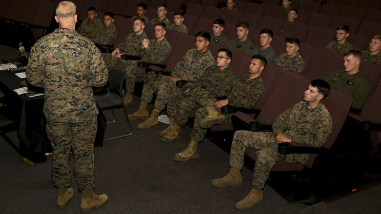 Marines listen to a Marine Corps Forces Special Operations Command recruiting brief at the Lasseter Theater aboard Marine Corps Air Station Beaufort, Dec. 13. Many of the Marines at the brief met the MARSOC recruiting criteria and were eligible to attend.