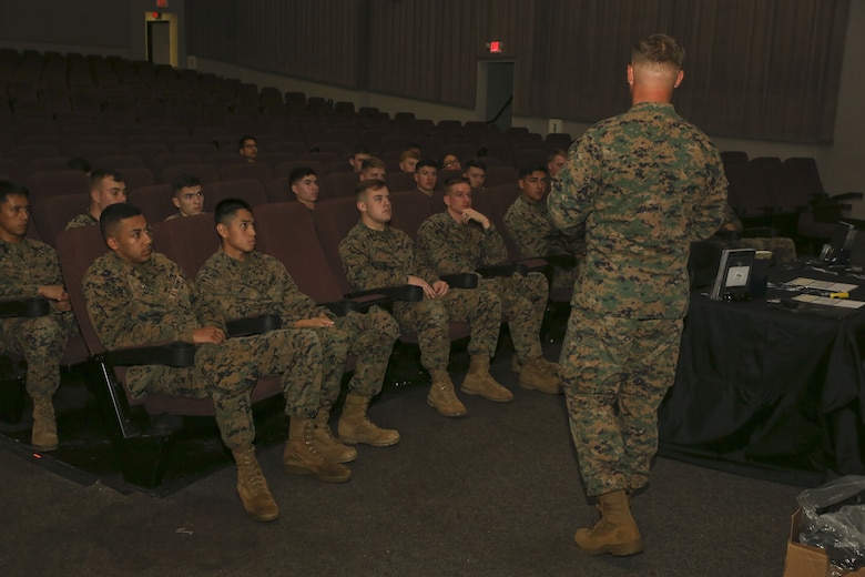 Marines listen to a Marine Corps Forces Special Operations Command recruiting brief at the Lasseter Theater aboard Marine Corps Air Station Beaufort, Dec. 13. Many of the Marines at the brief met the MARSOC recruiting criteria and were eligible to attend.