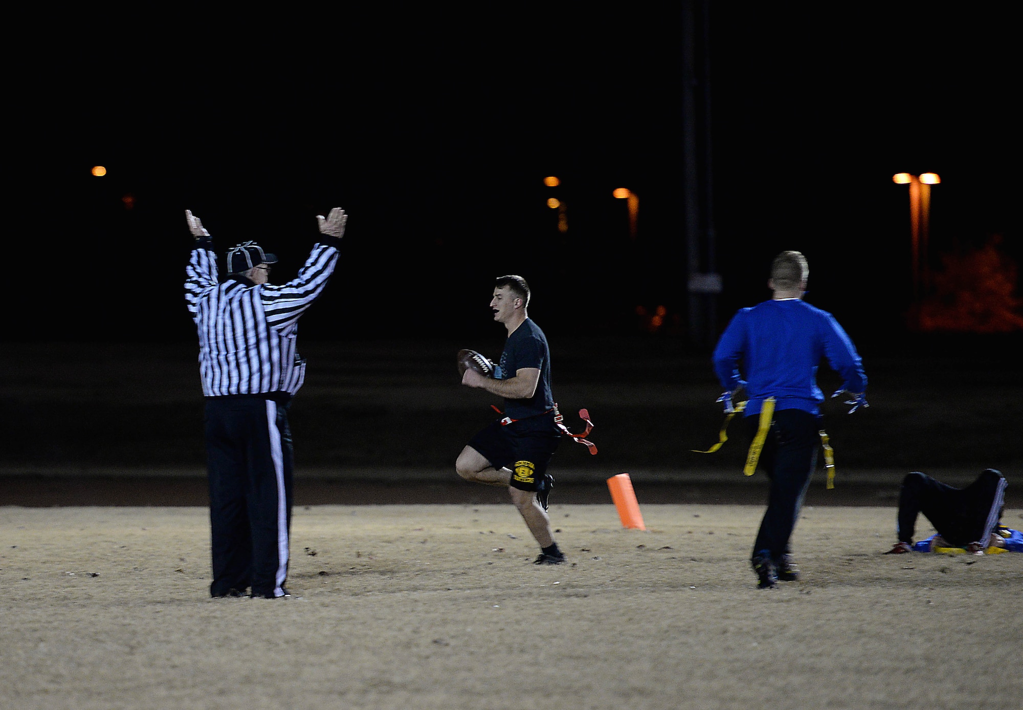 Staff Sgt. Nicholas Bahr, 14th Operations Support Squadron, scores a touchdown on a 20-yard run Dec. 14, 2017, on Columbus Air Force Base, Mississippi. Bahr had numerous plays helping the 14th OSS beat the 14th Student Squadron 20-7 in the Columbus Air Force Base intramural flag football championship game. (U.S. Air Force photo by Airman 1st Class Keith Holcomb)