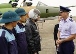 HO CHI MIN CITY, Vietnam -  Gen. Terrence J. O'Shaughnessy, Pacific Air Forces commander, talks with a Vietnamese Air Defense-Air Force (ADAF) pilot, Noi Bai Air Base, Vietnam, Dec. 15. O'Shaughnessy and Chief Master Sgt. Anthony Johnson, PACAF command chief, visited the country to affirm the United States' shared commitment to peace and prosperity in the Indo-Pacific region, as well as to seek opportunities for advancing partnership and cooperation with the ADAF.