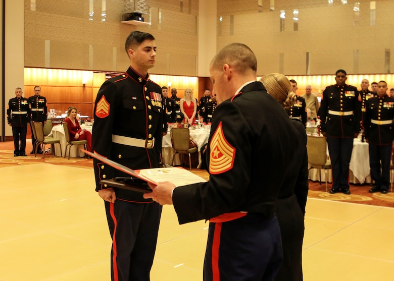 Sgt. Jonathan Orlando stands at attention before receiving his award during the 242nd Marine Corps Birthday Ball at Lumiere Place Casino and Hotel, St. Louis, Missouri, Nov. 10. Orlando, recruiter with Recruiting Sub Station Morris, was awarded the RS Rookie Recruiter of the Year 2017 for Marine Corps Recruiting Command, Recruiting Station St. Louis. (US Marine Corps photo by Cpl. Harley Robinson)