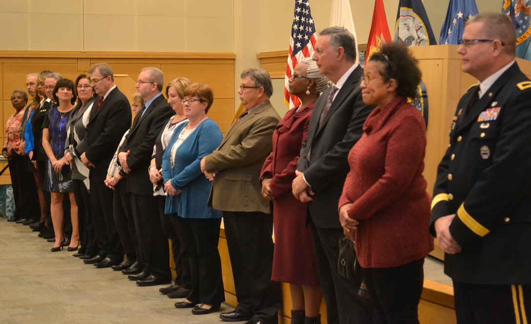 Seventeen DLA Troop Support retirees with 638 combined years of service were honored during a retirement ceremony Dec. 21. The group, standing with DLA Troop Support Commander Army Brig. Gen. Mark Simerly, was the largest to retire during 2017.