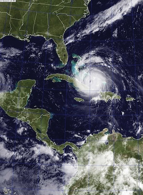 A satellite image from September 7, 2017 shows Hurricane
Irma (center) and Hurricane Jose (right) in the Atlantic Ocean
and Hurricane Katia in the Gulf of Mexico. (U.S. Navy)