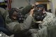 Staff Sgt. Michael Williams, 366th Aircraft Maintenance Squadron weapons load crew team chief, performs a buddy check on Staff Sgt. Anthony Slone, 366th Equipment Maintenance Squadron armament technician Dec. 20, 2017, at Mountain Home Air Force Base, Idaho. CBRNE training prepares Airmen to survive and work in a harmful environment anywhere in the world. (U.S. Air Force photo by Airman 1st Class JaNae Capuno)