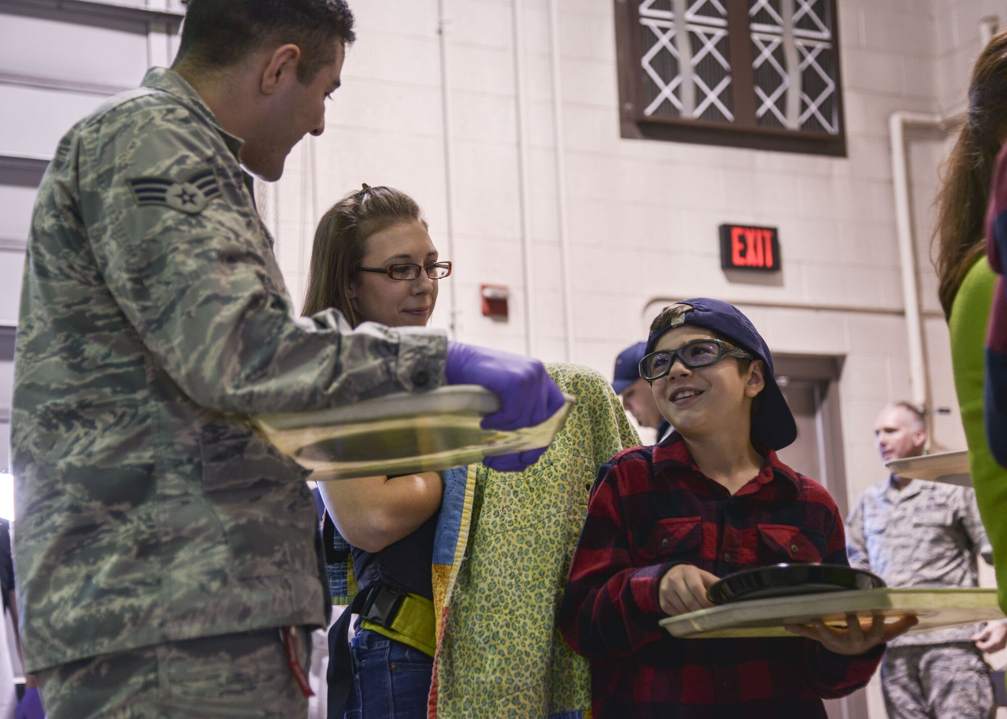 The Kirtland Fire Department hosted the 39th annual Operation Holiday Cheer on Dec. 20 at Kirtland Air Force Base, New Mexico. This event serves underprivileged families in the local communities by giving them a full holiday meal and a visit with Santa, who sends them home with a gift.