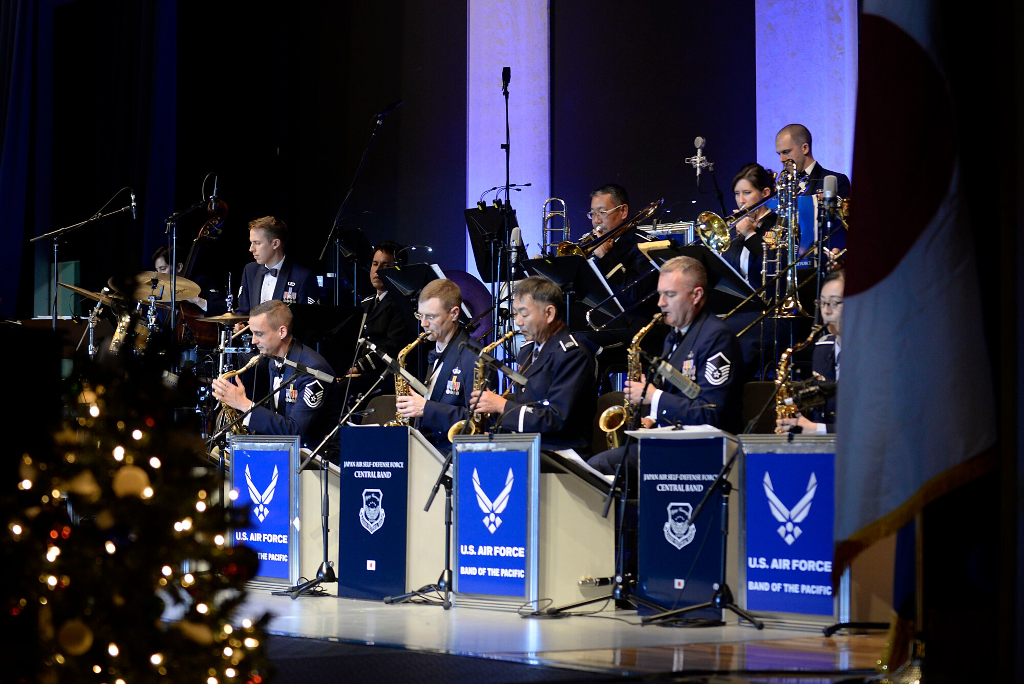 Members of the U.S. Air Force Band of the Pacific and Koku Jietai Central Band, perform at the Sounds of the Season concert, Dec. 19, 2017, at Yokota Air Base, Japan.