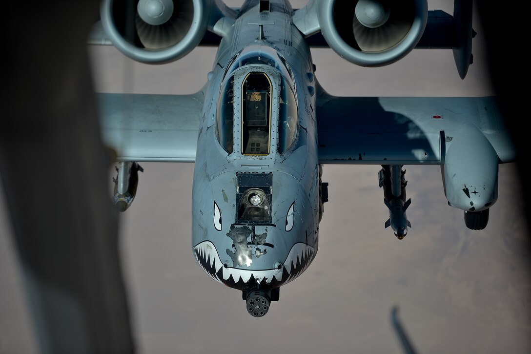 A U.S. Air Force A-10 Thunderbolt II pilot, currently assigned to the 332nd Air Expeditionary Wing, approaches a KC-10 Extender before an aerial refuel over Iraq Dec. 2, 2017. The A-10 has a wide combat radius and short takeoff and landing capability allowing for it to permit operations in and out of locations near front lines. (U.S. Air Force photo by Tech. Sgt. Anthony Nelson Jr.)