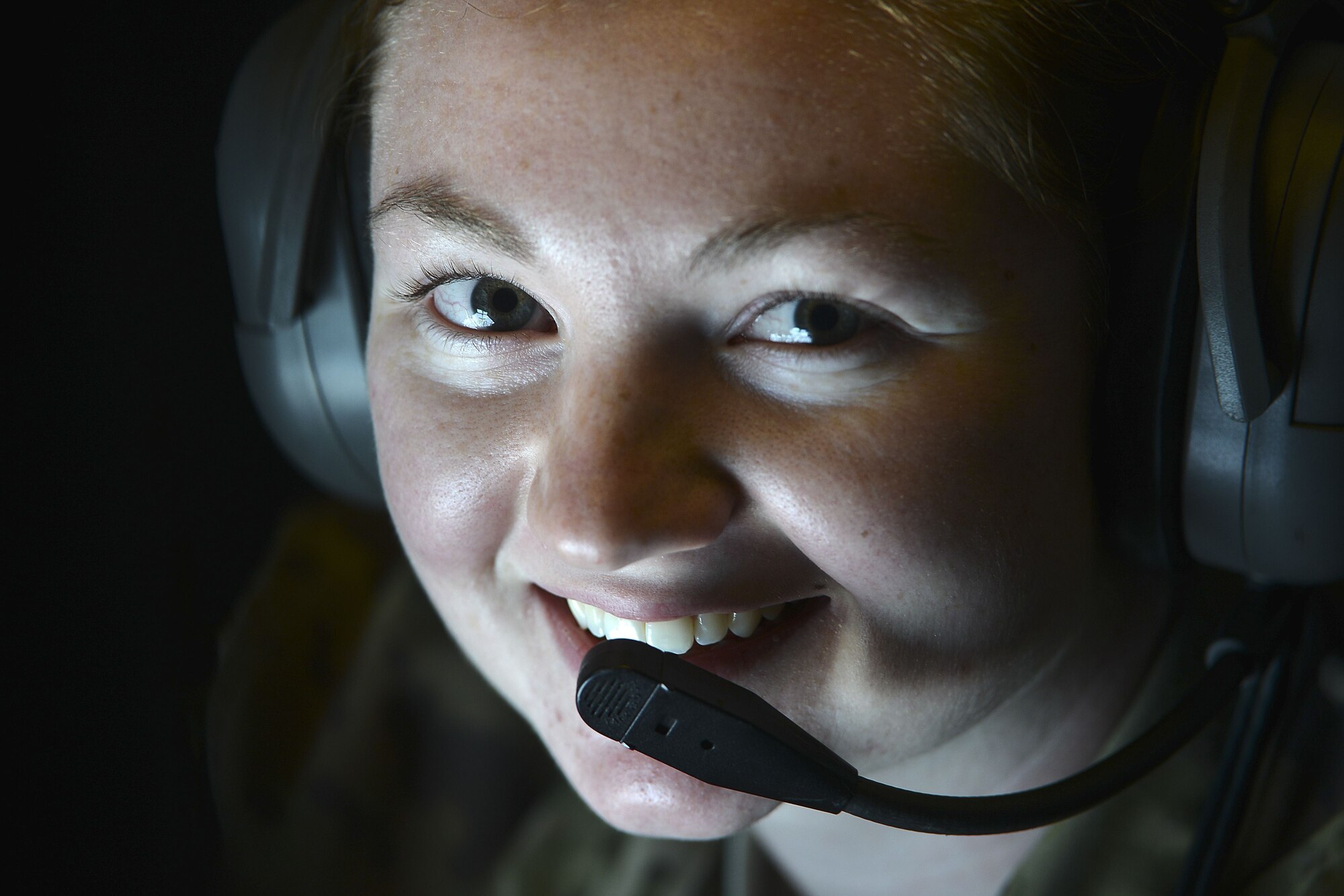 Airman 1st Class Katlin Hubbard, an air refueling operator assigned to the 908th Expeditionary Air Refueling Squadron, poses for a photograph before conducting a system check prior to an air refueling mission over Iraq, Dec. 2, 2017.
 The refueling mission of the KC-10 provides direct support to U.S. and Coalition aircraft in order to deliver decisive airpower and defend the region. 
 (U.S. Air Force photo by Tech. Sgt. Anthony Nelson Jr.)