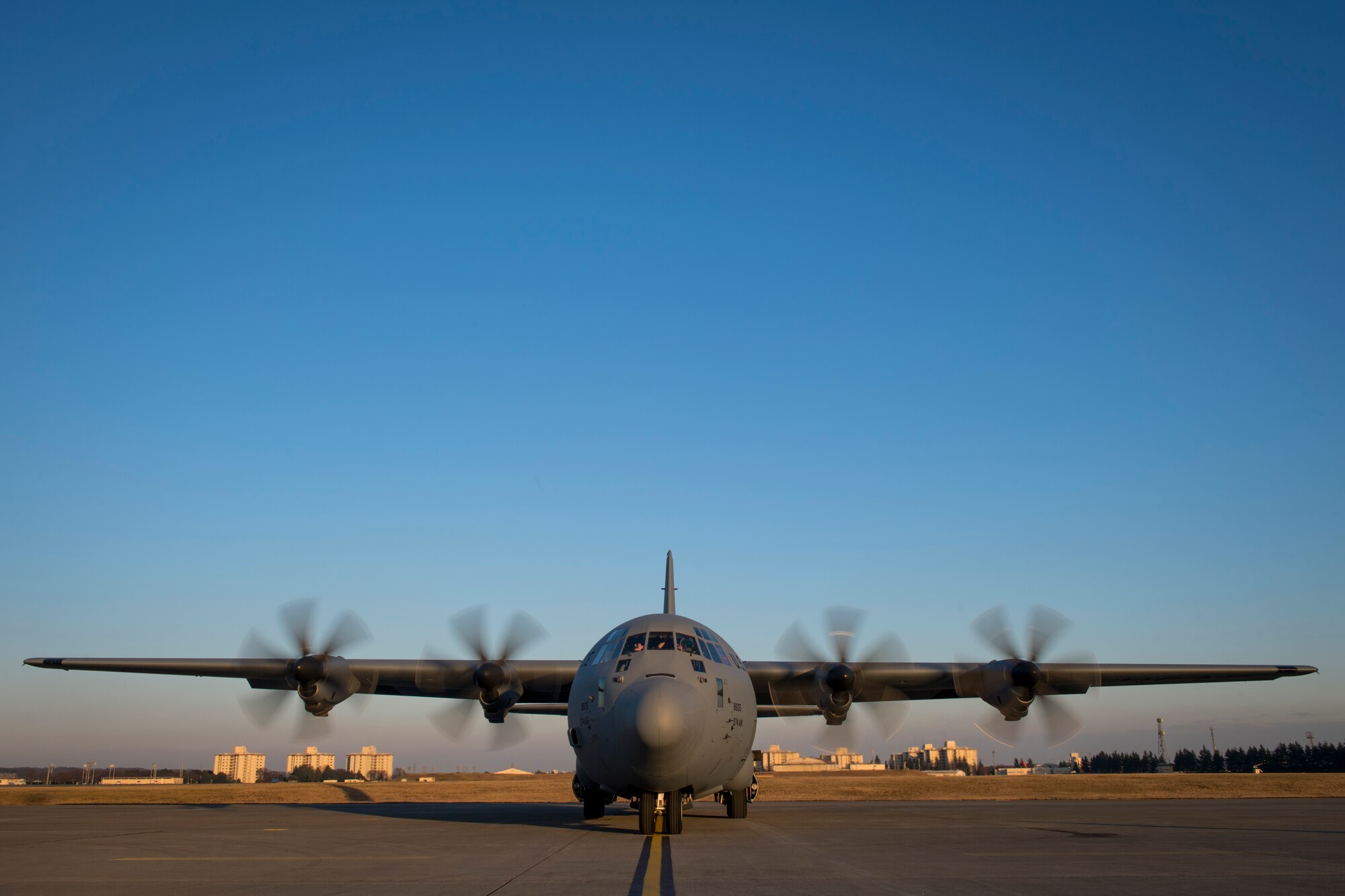 A C-130J Super Hercules parks on the runway, Dec. 21, 2017, at Yokota Air Base, Japan.