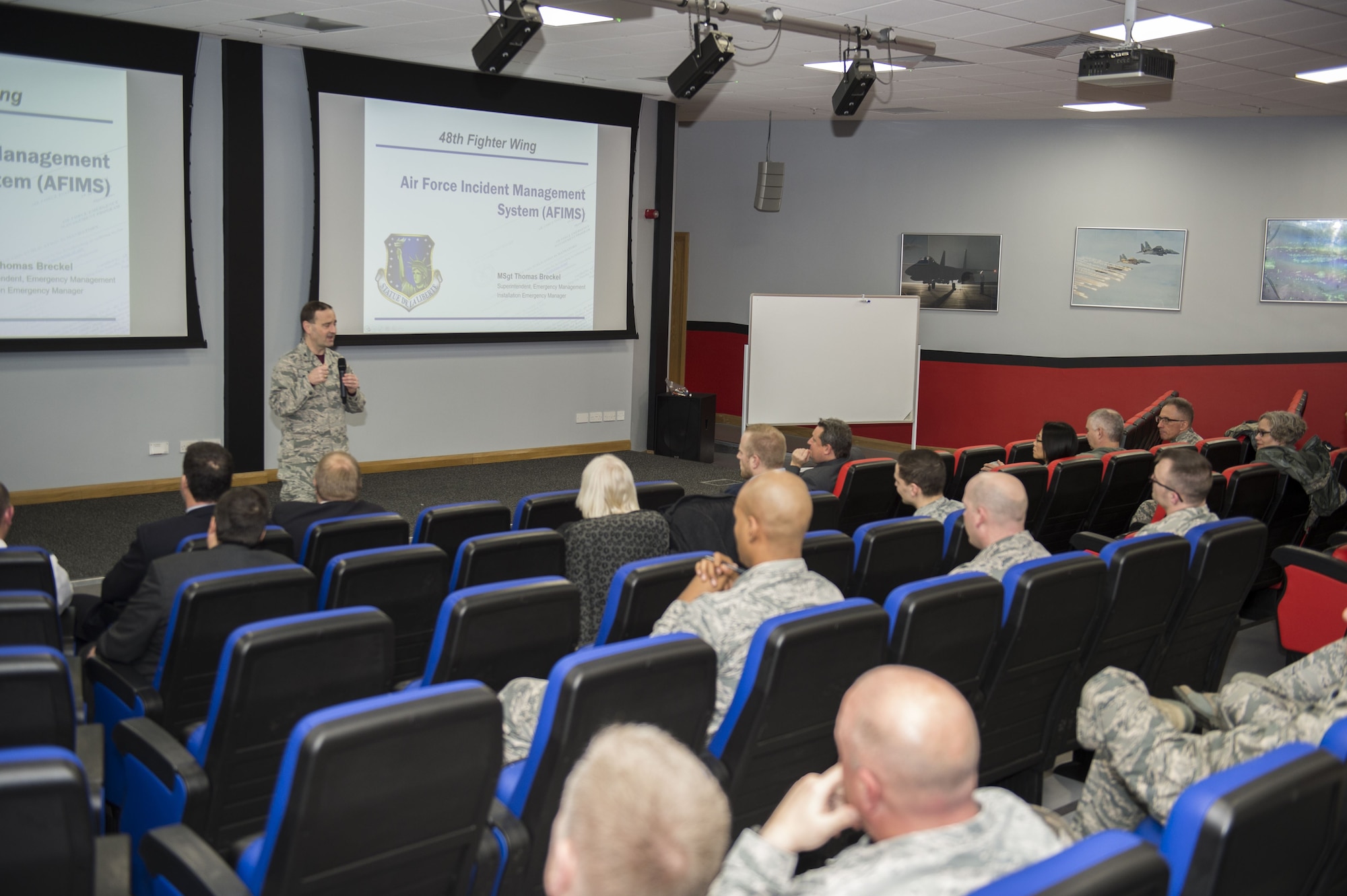Col. Lee Williames, 48th Medical Group commander, speaks to members of the U.K. National Health Service, 48th MDG and other first responders during an emergency management orientation and crosstalk event at Royal Air Force Lakenheath, England, Dec. 15. The event’s purpose was to provide an opportunity for the attending agencies to discuss the procedures used during major or minor incidents, such as natural disasters, terrorist attacks and car accidents. Members of the U.K. National Health Service, 48th Fighter Wing Medical Group and other first responders discuss major or minor incident scenarios during an emergency management orientation and crosstalk event at Royal Air Force Lakenheath, England, Dec. 15. The EM orientation and crosstalk was the first part of a three-step plan with the final portion being a functional exercise. (U.S. Air Force photo/Tech. Sgt. Emerson Nunez)