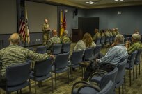 Maj. Jason Engelbrecht, future operations officer, Joint Task Force Civil Support addresses members of JTF-CS during his end of tour award ceremony December 20, 2017.