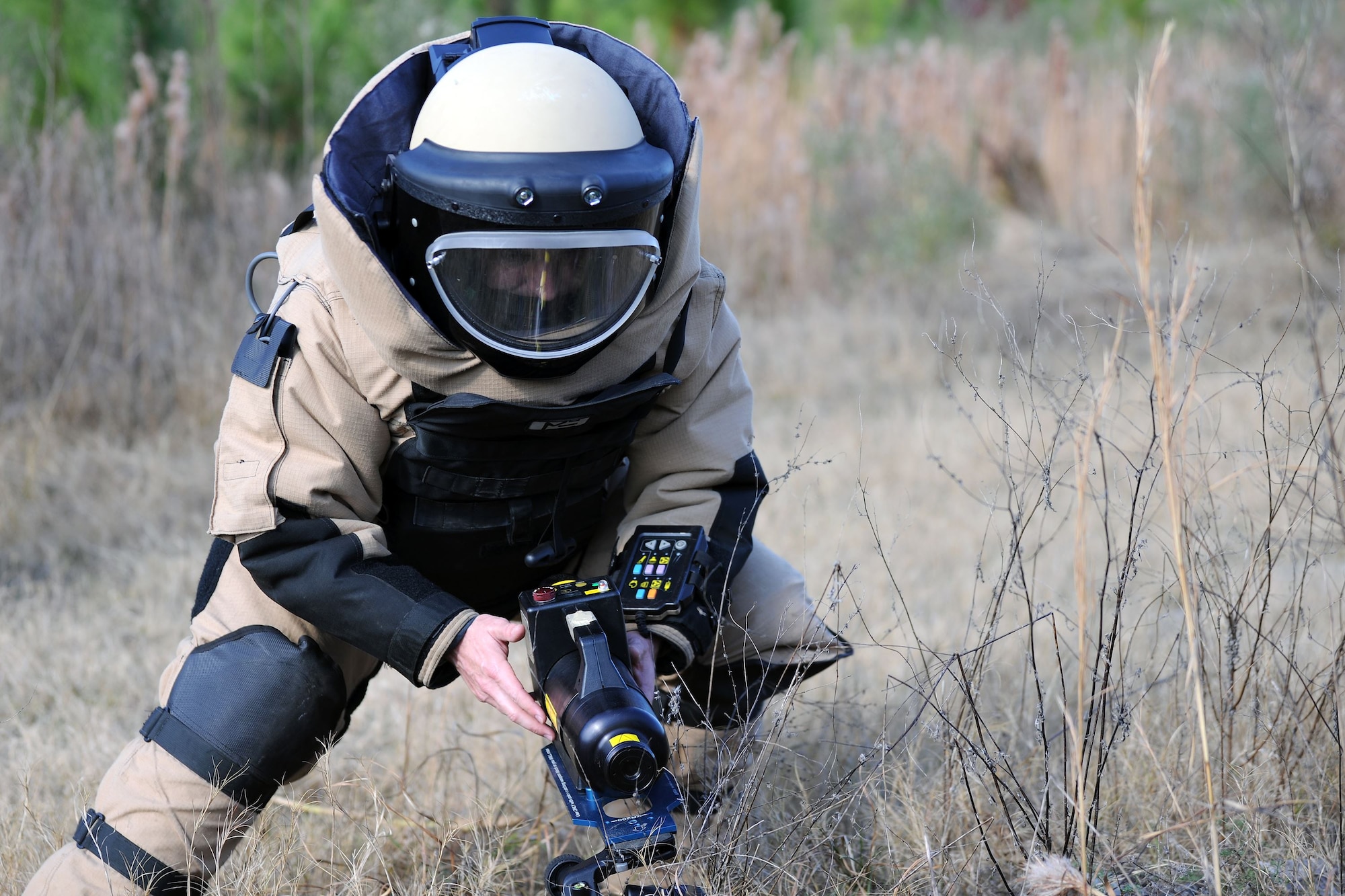 Tech. Sgt. Nickolas Adkisson, 23d Civil Engineer Squadron Explosive Ordinance Disposal (EOD) team leader, places a radiation device on the ground during a response training exercise, Dec. 21, 2017, at Moody Air Force Base, Ga.