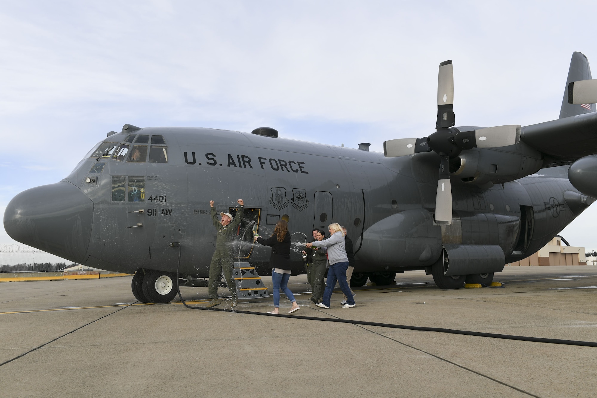 Chief Master Sgt. Bruce Bair, flight engineer superintendent with the 758th Airlift Squadron, celebrated the final flight of his enlistment at the Pittsburgh International Airport Air Reserve Station, Pennsylvania, December 21, 2017. Bair has served in the military for nearly 38 years. (U.S. Air Force photo be Senior Airman Beth Kobily)