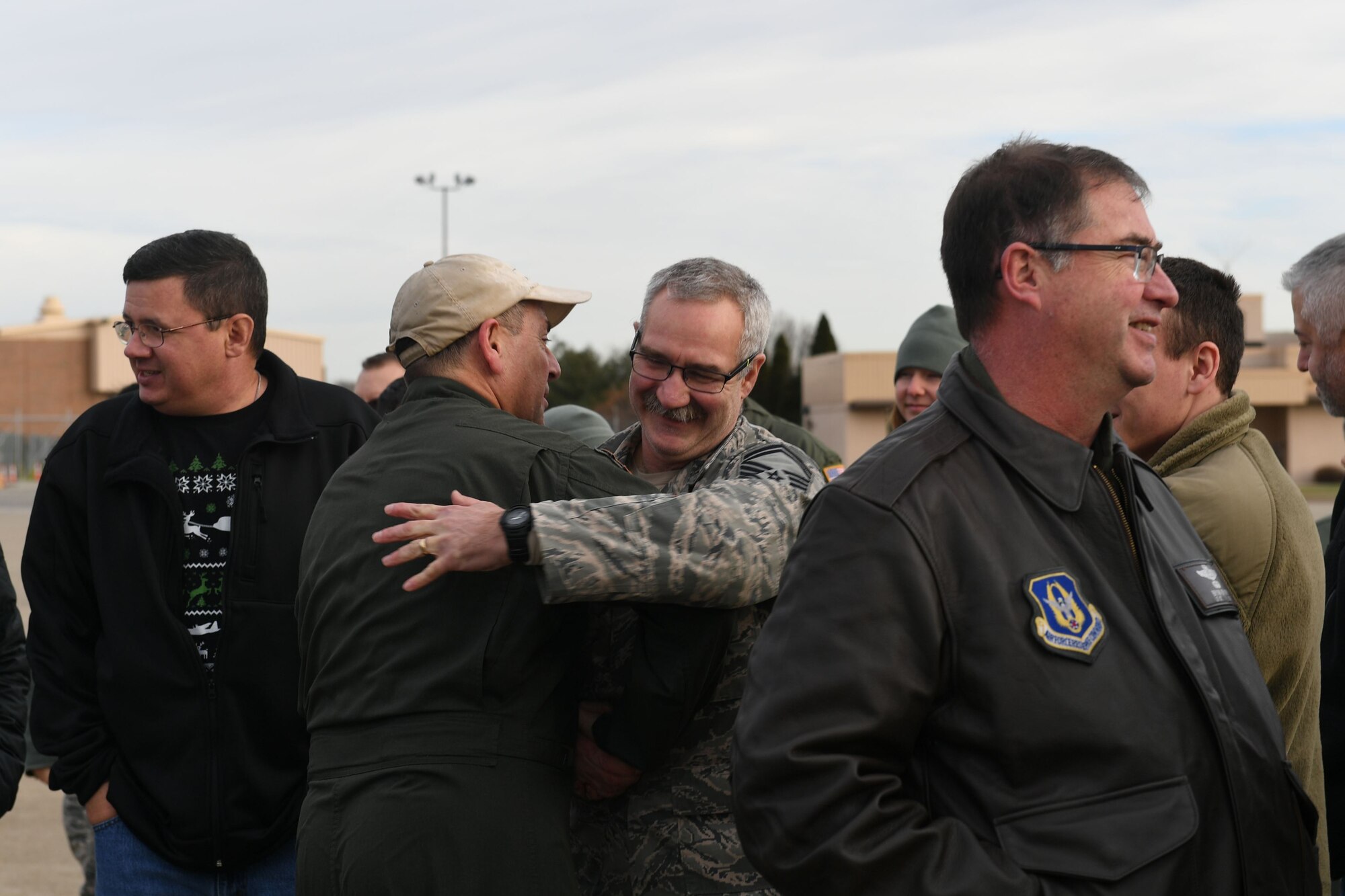 Chief Master Sgt. Bruce Bair, flight engineer superintendent with the 758th Airlift Squadron, celebrated the final flight of his enlistment at the Pittsburgh International Airport Air Reserve Station, Pennsylvania, December 21, 2017. Bair has served in the military for nearly 38 years. (U.S. Air Force photo be Senior Airman Beth Kobily)