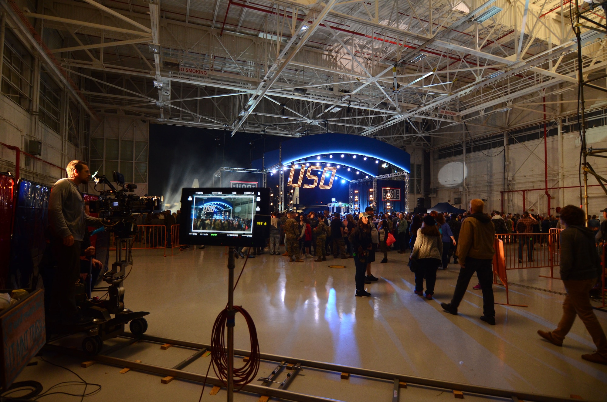 Movie extras walk to a concert on the movie set of Pitch Perfect 3, filmed at Dobbins Air Reserve Base, Ga. March 18, 2017. The base was made to look like Rota, Spain. (U.S. Air Force photo/Don Peek)