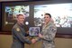 Brig. Gen. Brooke Leonard, 56th Fighter Wing commander, recognizes Staff Sgt. Dean Saunders, 56th Medical Operations Squadron noncommissioned officer in charge of the pediatrics clinic, as the Thunderbolt of the Week Dec. 19, 2017 at Luke Air Force Base. Saunders was awarded for fulfilling the role of officer in charge of the Pediatrics clinic for four months, preparing the clinic for two inspections. (U.S. Air Force photo/Senior Airman James Hensley)