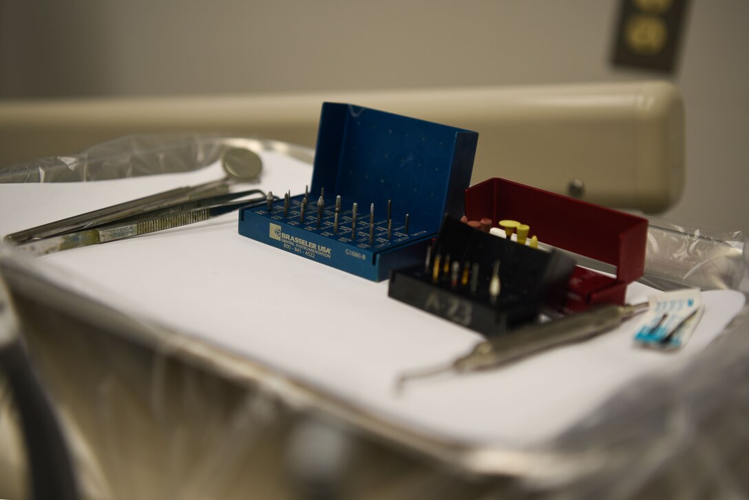 Dental tools are displayed in preparation for the dentist to replace a tooth crown at the dental clinic on F.E. Warren Air Force Base, Wyo., Dec. 19, 2017. The various tools are prepared by the dental assistant before every appointment and are laid out according to the appointment needs. The mission of the U.S. Air Force Dental Corps is to achieve superior oral health and global readiness through safe, effective and patient-centered care. (U.S. Air Force photo by Airman 1st Class Abbigayle Wagner)