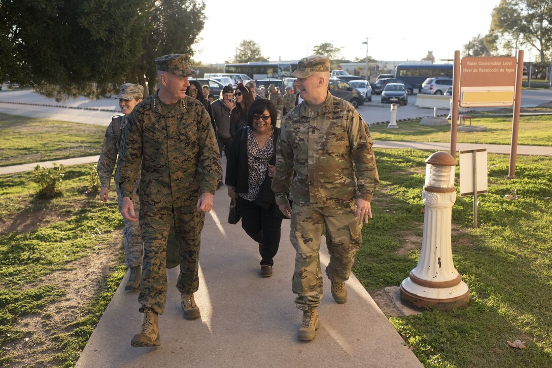 Marine Corps Gen. Joe Dunford, chairman of the Joint Chiefs of Staff, and Command Sgt. Maj. John W. Troxell, senior enlisted advisor to the chairman of the Joint Chiefs of Staff walk together.