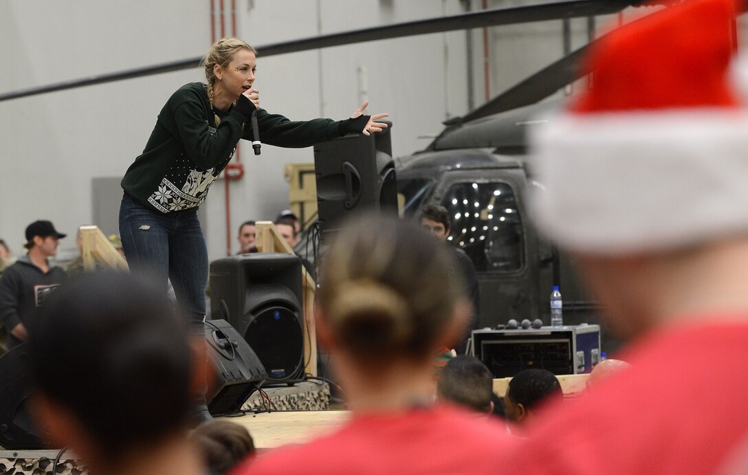 Comedian Iliza Shlesinger, performs for service members currently deployed to Bagram Airfield troops during the 2017 Chairman's USO Holiday Tour Dec. 24, 2017 at Bagram Airfield, Afghanistan.