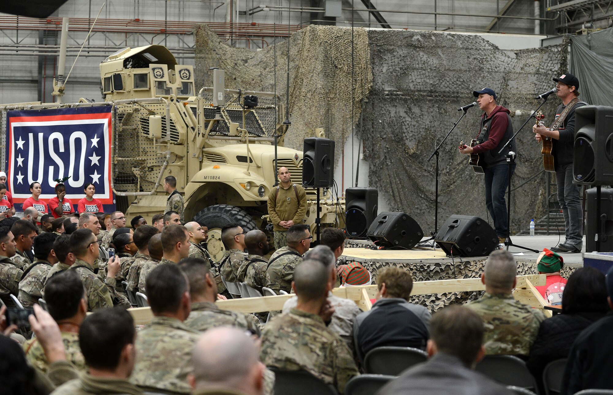 Singer Jerrod Niemann, performs for service members currently deployed to Bagram Airfield troops during the 2017 Chairman's USO Holiday Tour Dec. 24, 2017 at Bagram Airfield, Afghanistan.
