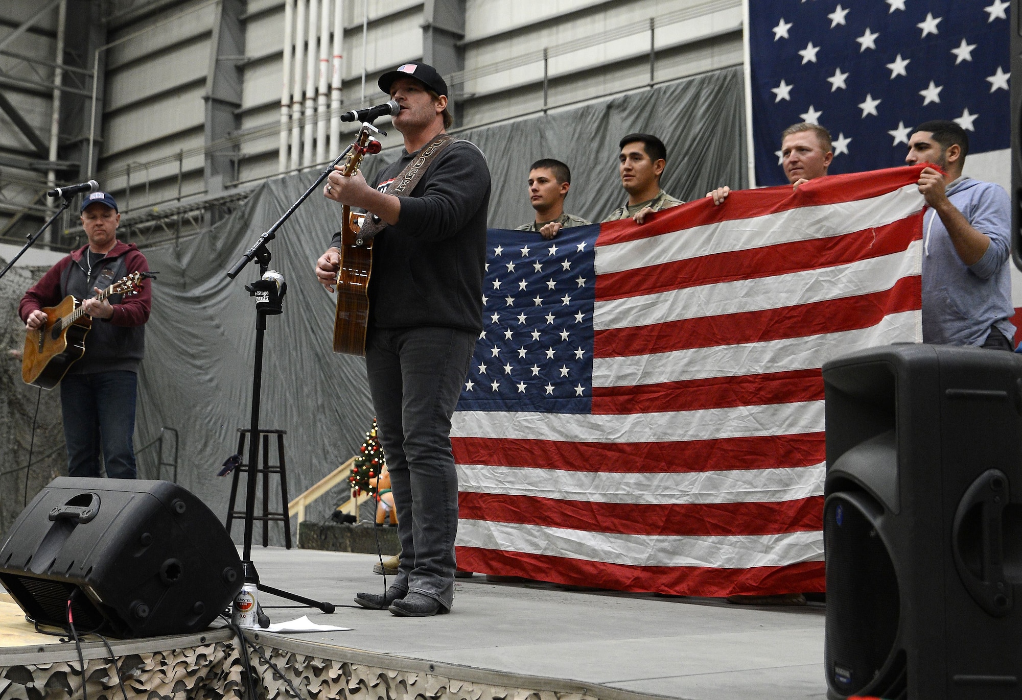 Singer Jerrod Niemann, performs for service members currently deployed to Bagram Airfield troops during the 2017 Chairman's USO Holiday Tour Dec. 24, 2017 at Bagram Airfield, Afghanistan.