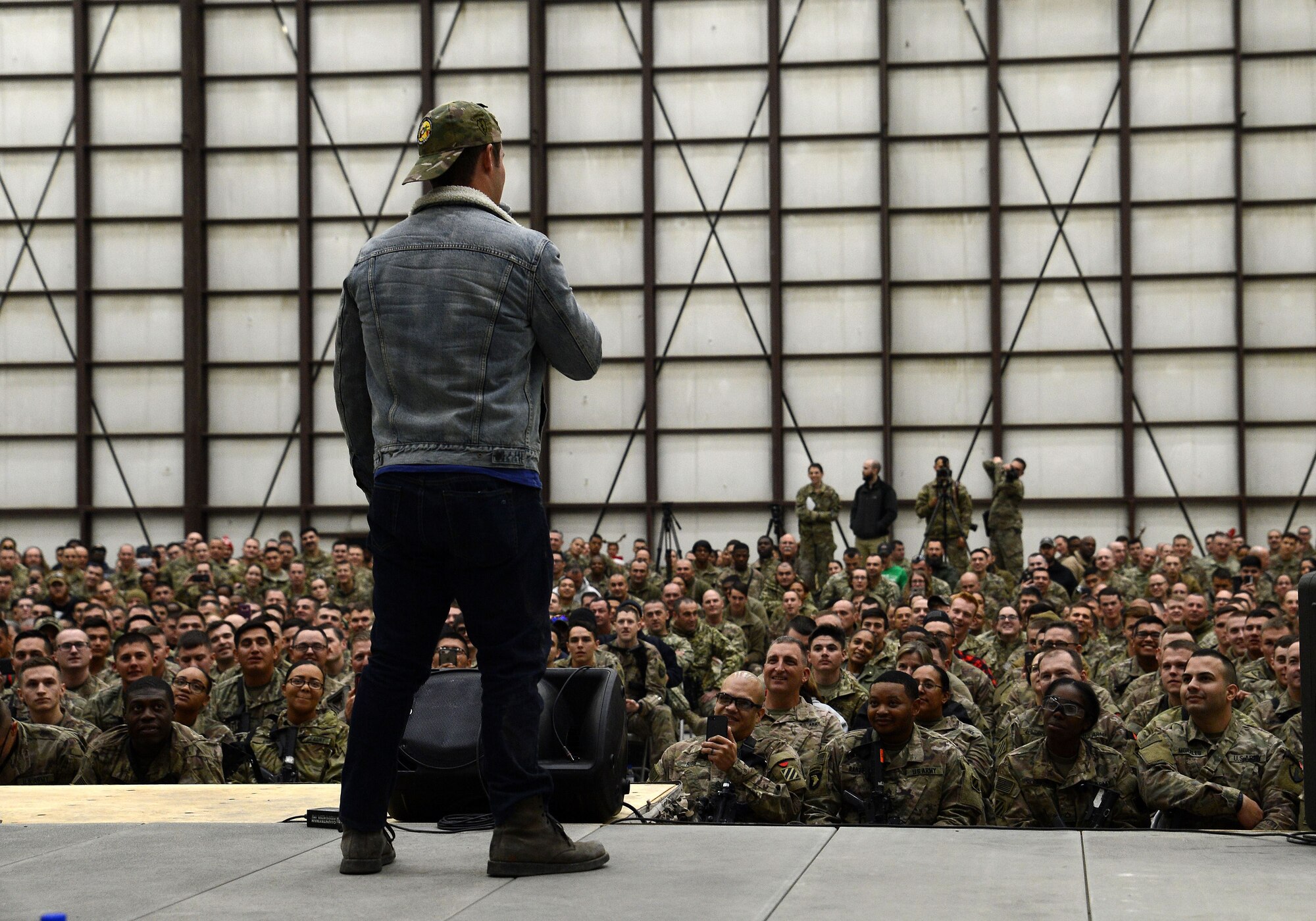 Actor Adam Devine host the 2017 Chairman's USO Holiday Tour Dec. 24, 2017 at Bagram Airfield, Afghanistan.
