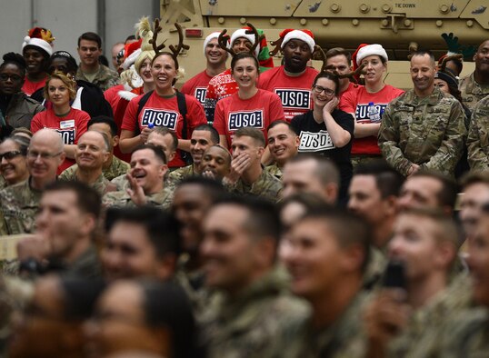 U.S. service members laugh during the 2017 Chairman's USO Holiday Tour Dec. 24, 2017 at Bagram Airfield, Afghanistan.