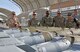 U.S. Army Lt. Gen. Paul Funk II, Combined Joint Task Force – Operation INHERENT RESOLVE commanding general, views F-16 Fighting Falcon weaponry at the 407th Air Expeditionary Group in Southwest Asia, Dec. 23, 2017. While visiting the 407th AEG, Funk met with the 100th Expeditionary Fighter Squadron to talk about their operations in Southwest Asia. (U.S. Air Force photo by Staff Sgt. Joshua Edwards/Released)