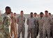 U.S. Army Command Sgt. Maj. Michael Crosby, Combined Joint Task Force – Operation INHERENT RESOLVE senior enlisted advisor, speaks with Marines at the 407th Air Expeditionary Group in Southwest Asia, Dec. 23, 2017. Crosby and U.S. Army Lt. Gen. Paul Funk II, CJTF – OIR commanding general, visited with 407th AEG personnel, sister services and coalition partners as they discussed current operations in Southwest Asia. (U.S. Air Force photo by Staff Sgt. Joshua Edwards/Released)
