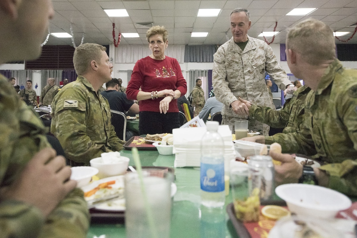 Marine Corps Gen. Joe Dunford, chairman of the Joint Chiefs of Staff, and his wife Ellyn Dunford speak to service members.