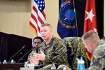 The DIA Command Senior Enlisted Leader Master Gunnery Sgt. Scott Stalker, center, emphasizes readiness across the workforce during an off-site for enlisted military service members, Dec. 18, at Joint Base Andrews, Maryland.