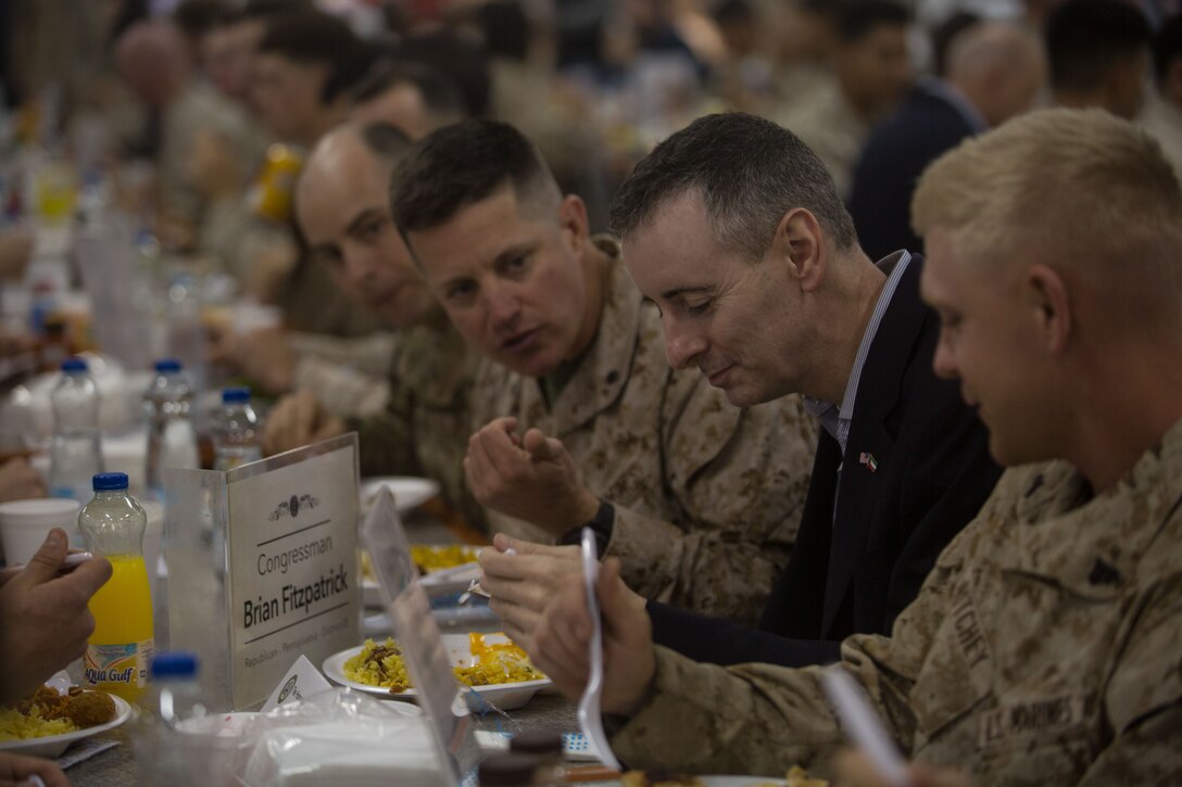 Brian Fitzpatrick, Republican Representative for Pennsylvania’s 8th Congressional District, talks to service members from his district about any concerns or questions they have about their home state during a visit to the Middle East Dec. 26, 2017. Fitzpatrick was part of a congressional delegation that visited service members currently forward deployed to learn about their mission and join them for the holidays.