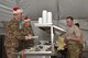 U.S. Air Force Lt. Gen. Scott Rice, Air National Guard director, and Chief Master Sgt. Ronald Anderson Jr., ANG command chief, serve Christmas lunch at the 407th Air Expeditionary Group in Southwest Asia, Dec. 25, 2017. They visited the 407th AEG to spend Christmas with Airmen. (U.S. Air Force photo by Staff Sgt. Joshua Edwards/Released)