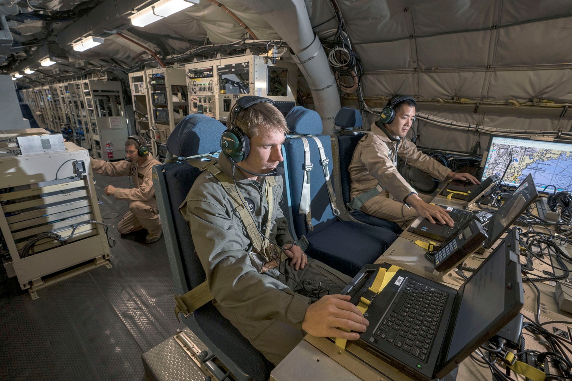 MIT Lincoln Laboratory personnel collect data during flight testing