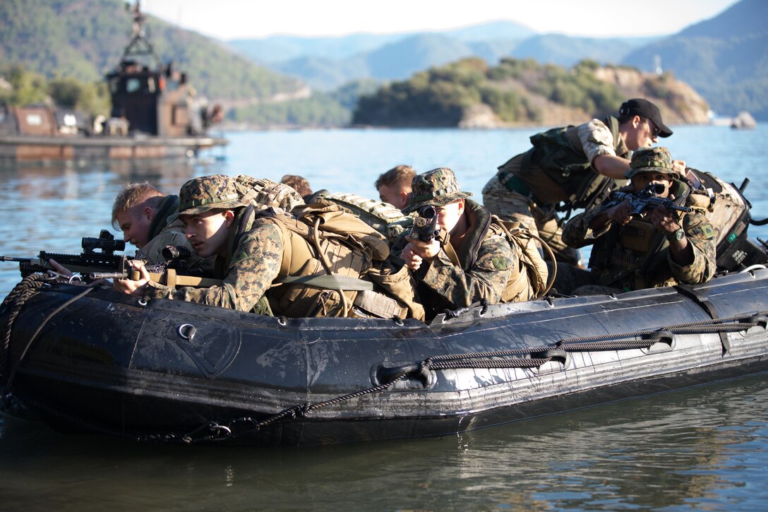 U.S. Marines with Black Sea Rotational Force 17.2 and Royal British Marines provide security on an inflatable raiding craft in Aksaz, Turkey Nov. 6, 2017. U.S. Marines participated in Exercise Blue Raptor, a training event involving United States, British, Turkish and Greek militaries to improve interoperability and strengthen NATO partnerships.  (U.S. Marine Corps photo by Cpl. David Luckey/Released)