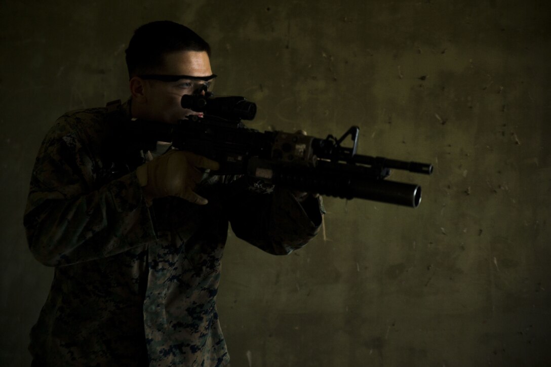 U.S. Marines with Special Purpose Marine Air-Ground Task Force-Crisis Response-Africa practice clearing a building during a military operations on urbanized terrain exercise at Morón Air Base, Spain, Dec. 14, 2017. SPMAGTF-CR-AF is deployed to conduct limited crisis-response and theater-security operations in Europe and North Africa. (U.S. Marine Corps photo by Sgt. Takoune H. Norasingh/Released)
